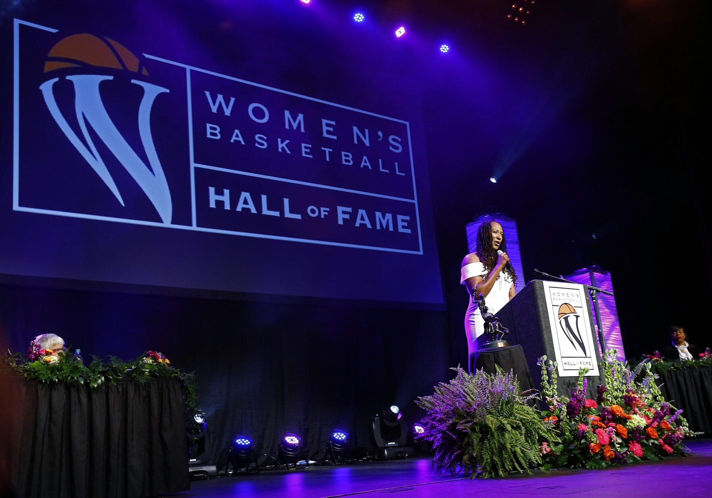 Chamique Holdsclaw speaks during induction ceremonies at the Women's Basketball Hall of Fame Saturday, June 9, 2018, in Knoxville, Tenn. (AP Photo/Wade Payne)